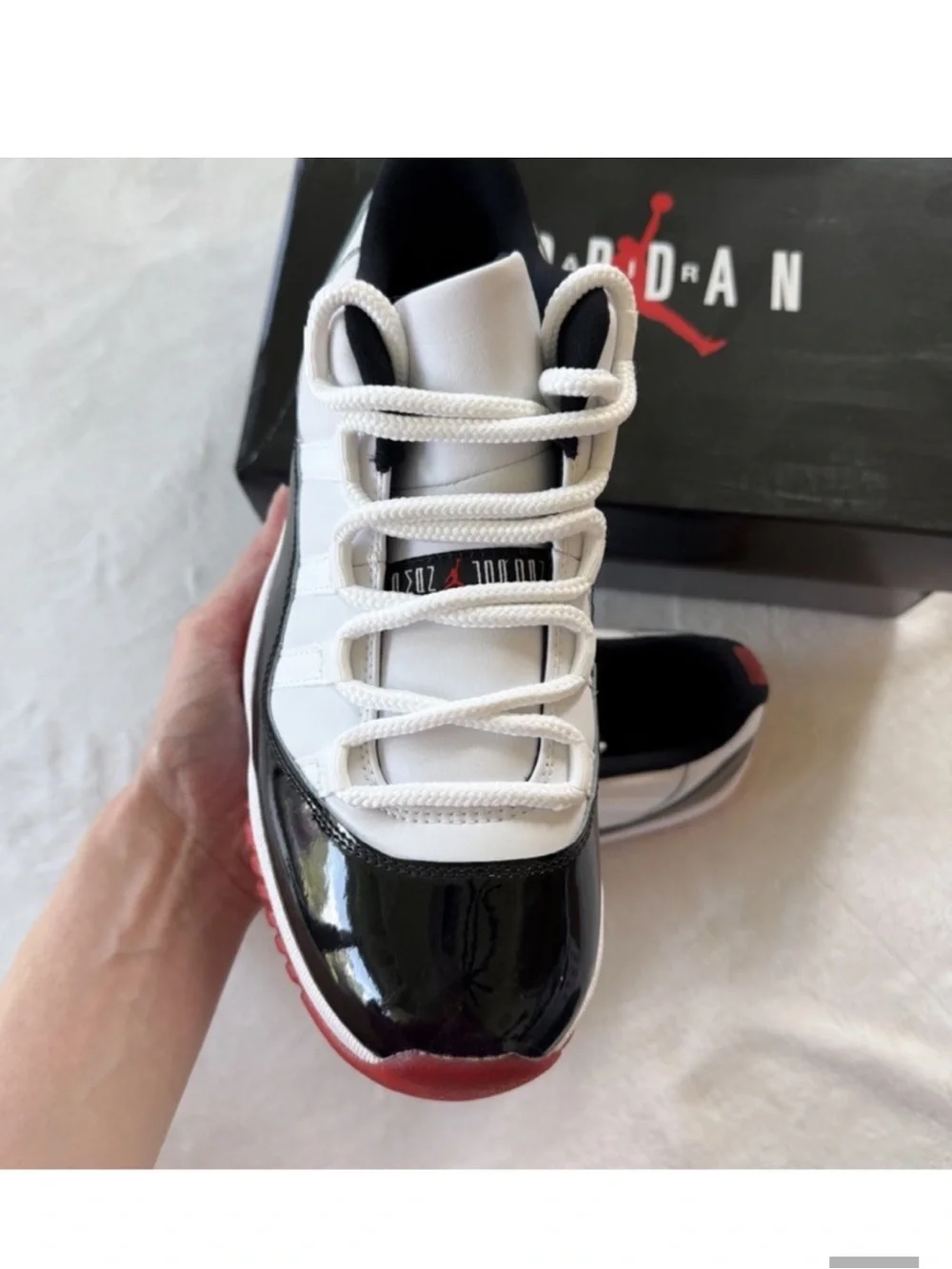 Air Jordan 11 Low Bred Black Red | Men's 8.5